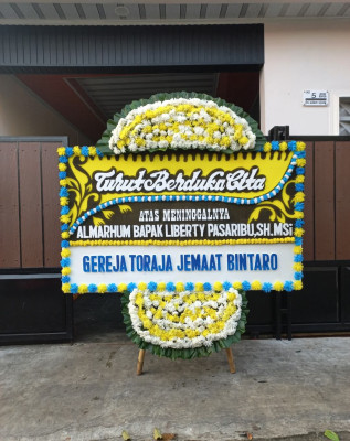 Papan Bunga Duka di Sudajaya Hilir